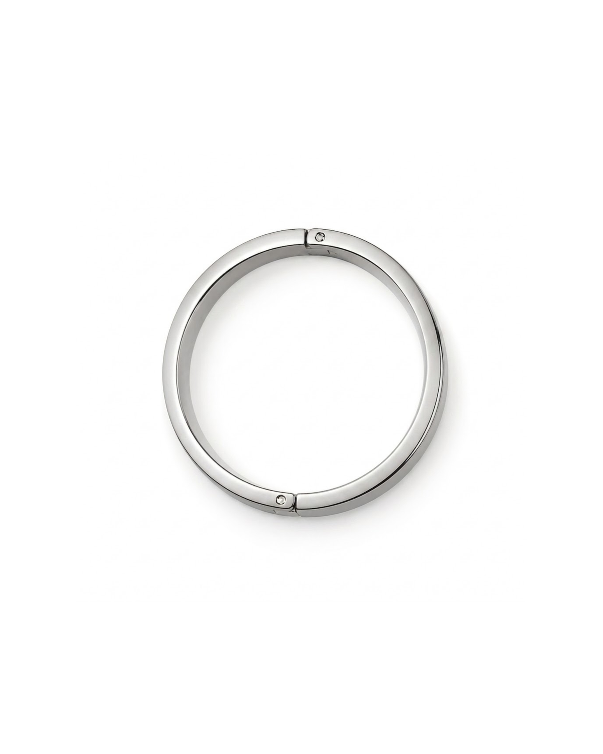 Silber Bag Clip - Polierter, kreisrunder Silber-Clip mit zwei kleinen Scharnieren an den Seiten, isoliert auf weißem Hintergrund.